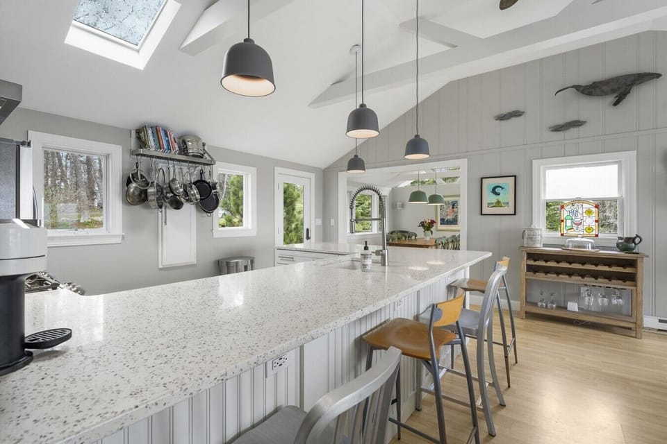 Breakfast bar with seating perfect for chatting with the chef