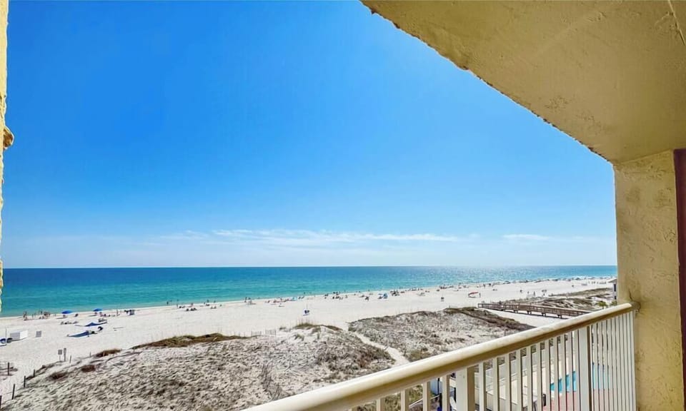 Lounge the day away or dine alfresco with ocean views on the balcony​