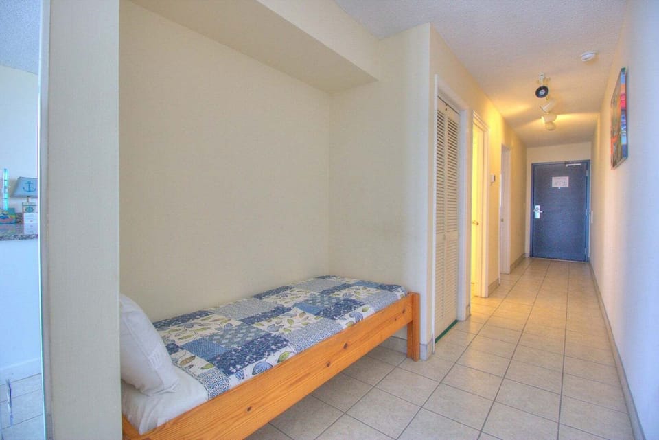 Atlantic Towers 702-print-013-011-Hall with single bed-4200x2805-300dpi