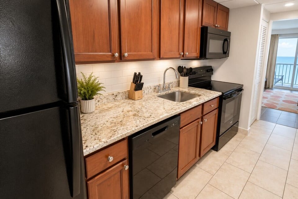 Whether you`re preparing a quick breakfast before the beach or cooking a family dinner, this fully equipped kitchen has everything you need. Featuring modern appliances, granite countertops, and ample workspace, it`s designed to make every meal easy and e
