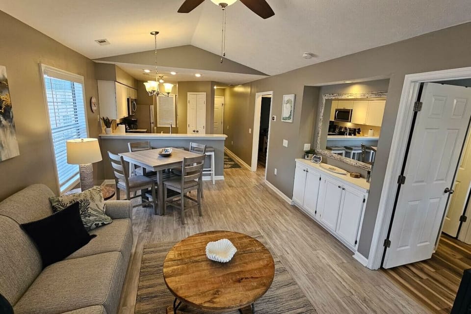 Enjoy a spacious and comfortable living room designed for relaxation and gathering. With plenty of room to spread out, it’s the perfect space to unwind together.