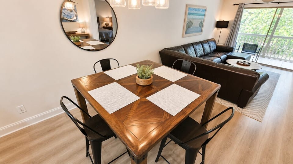 Gather around the table for leisurely breakfasts before the beach or the golf course, family dinners after a day of adventure, or a friendly game night that stretches into the evening. The open layout keeps everyone connected, whether you`re preparing a m