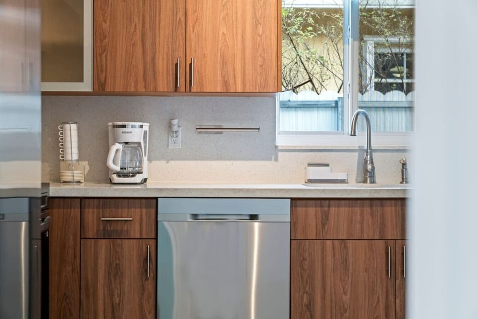 Kitchen: Modern clean lines meet a soft, inviting ambiance