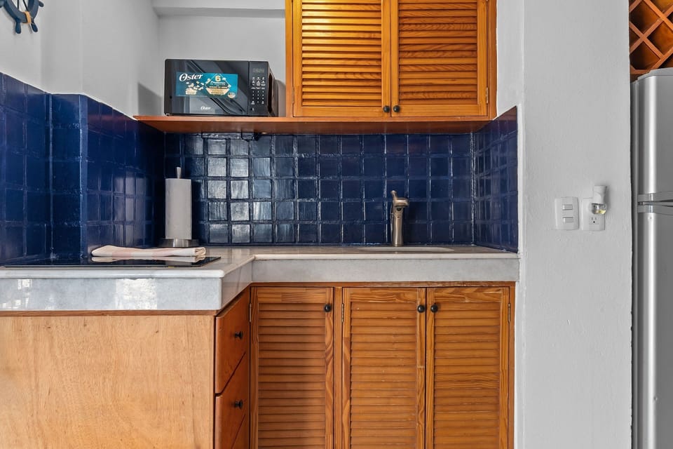 Luxury Apartment | Private kitchen | Fridge, microwave, stovetop, dishwasher