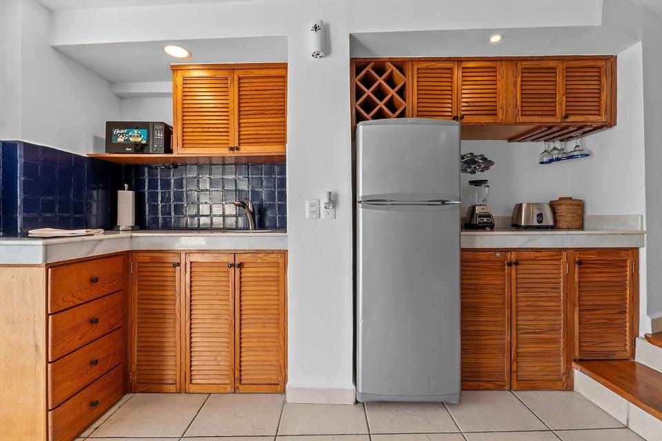 Luxury Apartment | Private kitchen | Fridge, microwave, stovetop, dishwasher