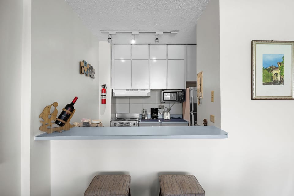 Apartment, Balcony, Pool View | Private kitchen