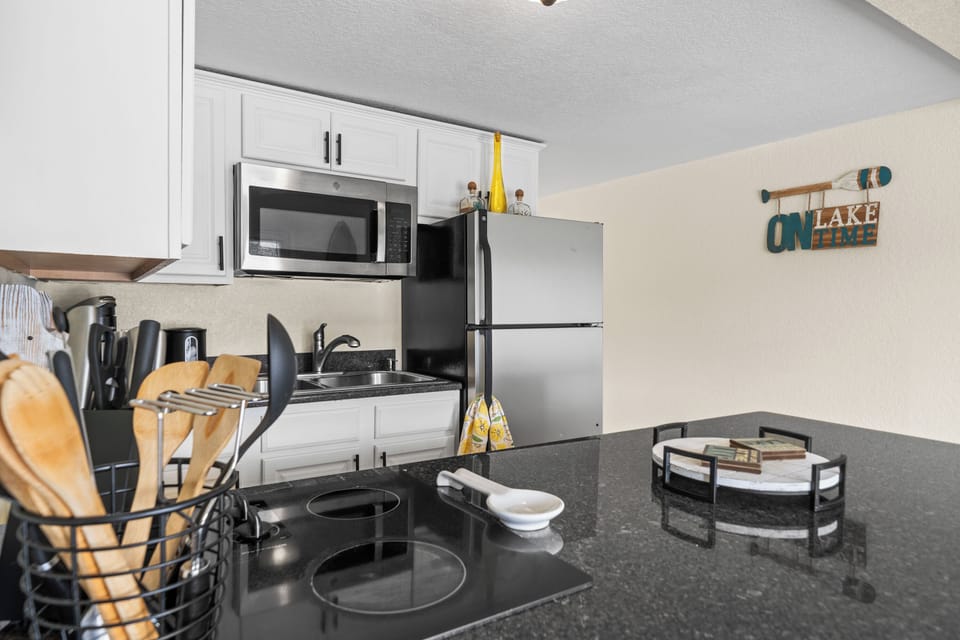 Prepare meals with ease in this well-stocked kitchenette.