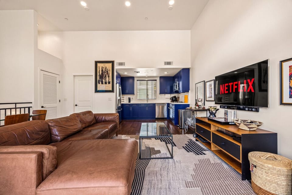 Open living area connecting to the fully equipped kitchen.