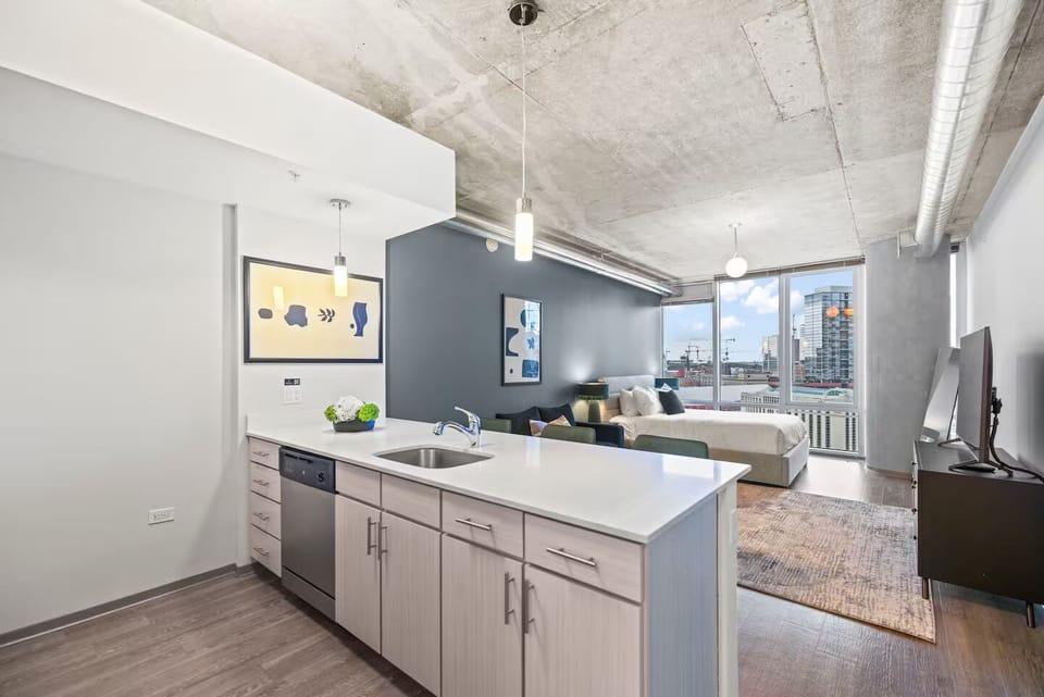 Cook and sip coffee at the sleek island breakfast bar.