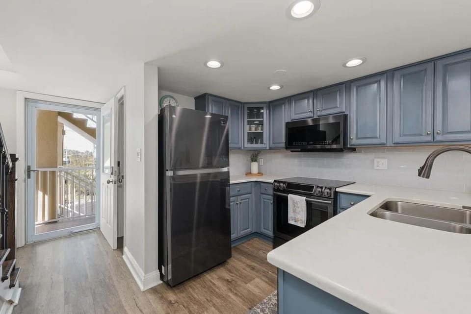 Modern kitchen with sleek appliances and ample counter space