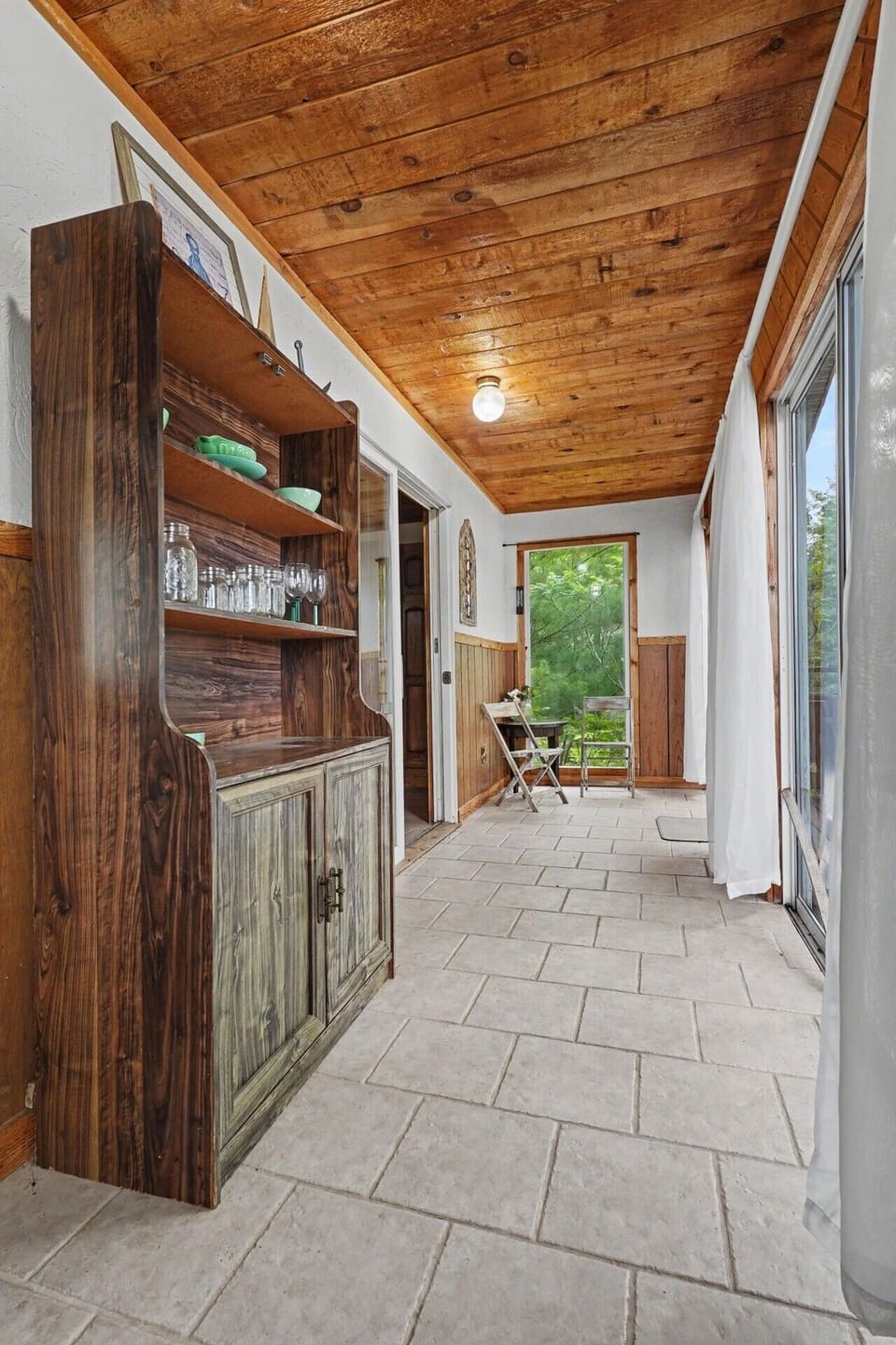 Sunroom | Lounge Space | Wooden Cabinet | Lake Views