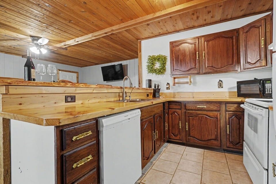 Kitchen | Dishwasher & Electric Range | Wood Accents