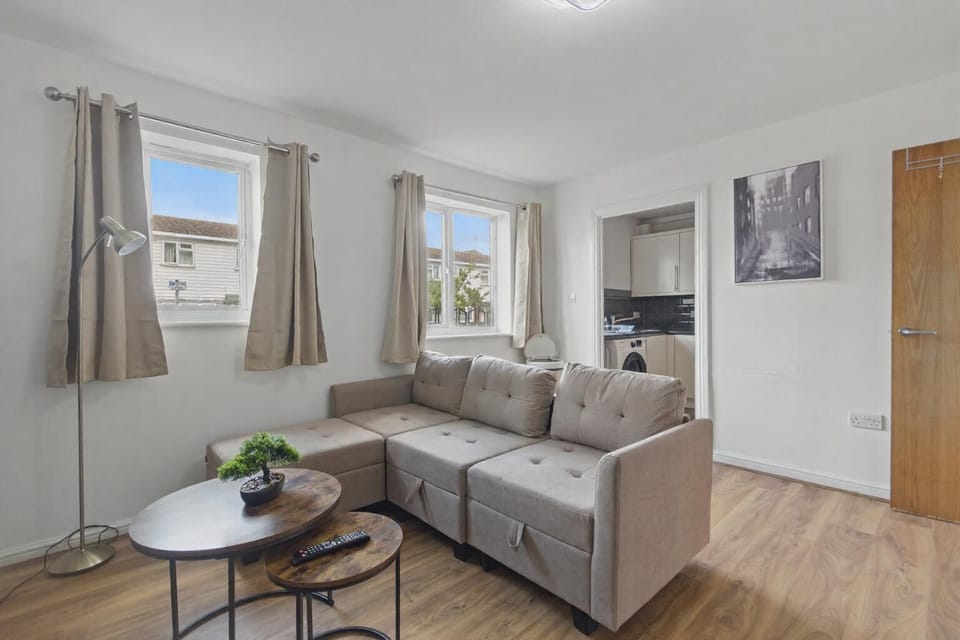 Comfort Apartment | Living area | 50-inch Smart TV with digital channels, Netflix, streaming services