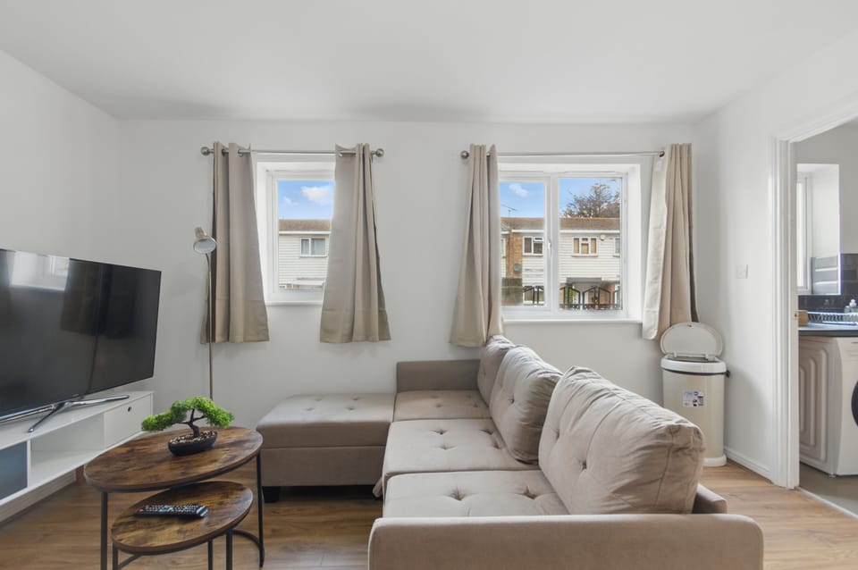 Comfort Apartment | Living area | 50-inch Smart TV with digital channels, Netflix, streaming services