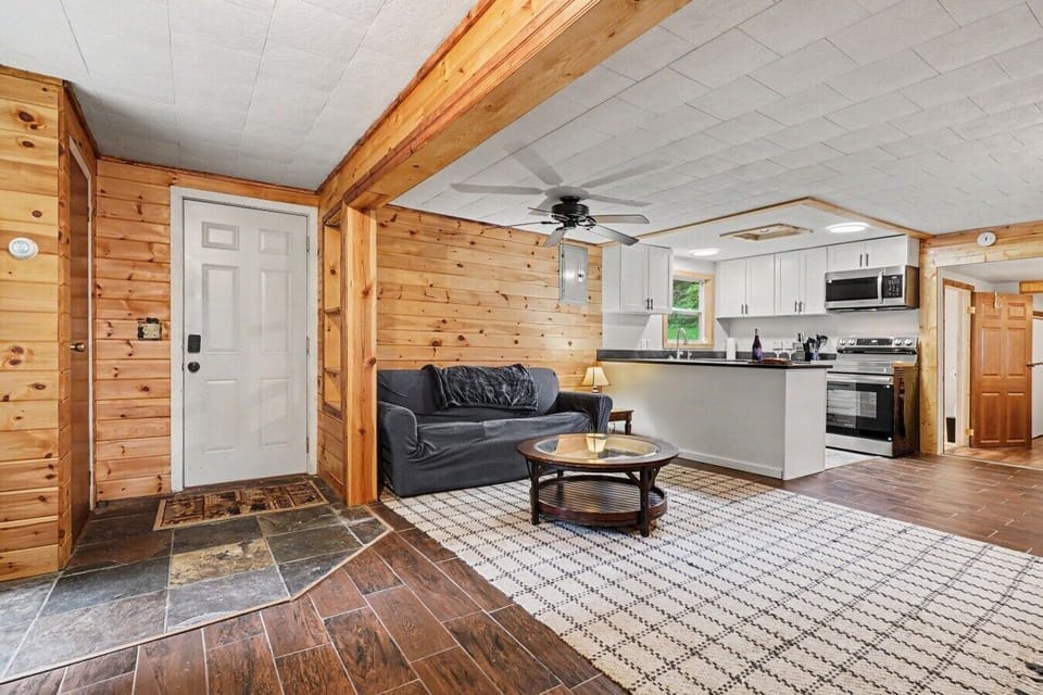 Open Living Area | Sectional Sofa | Ceiling Fan & Open Kitchen Layout