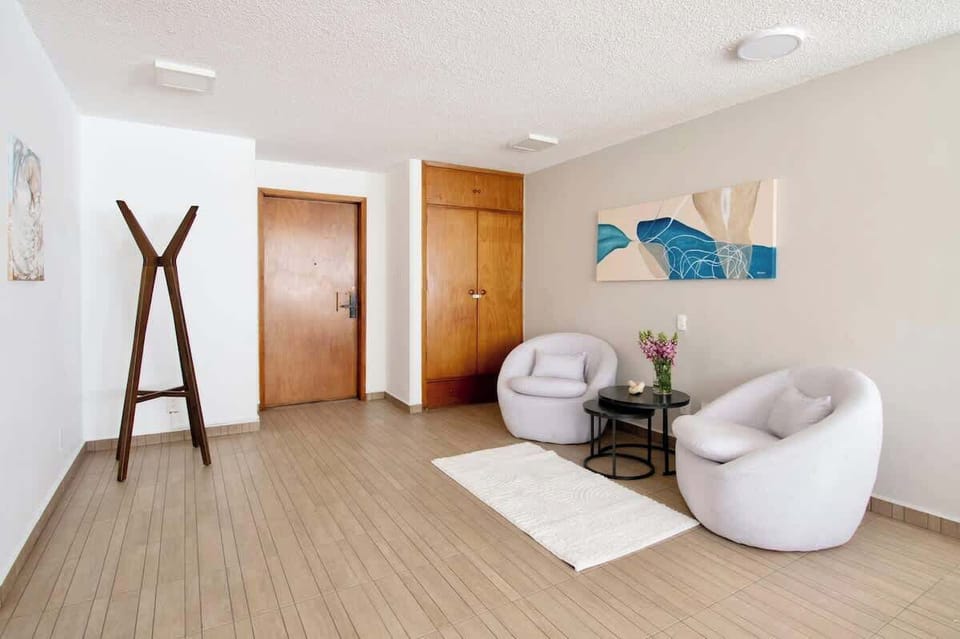 A spacious entry welcomes you into this beautiful apartment, complete with a convenient coat rack