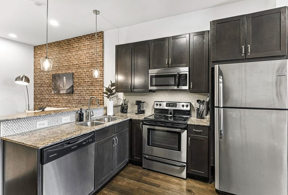 Fully equipped kitchen with stainless steel appliances and Keurig coffee maker/start pack of K cups provided
