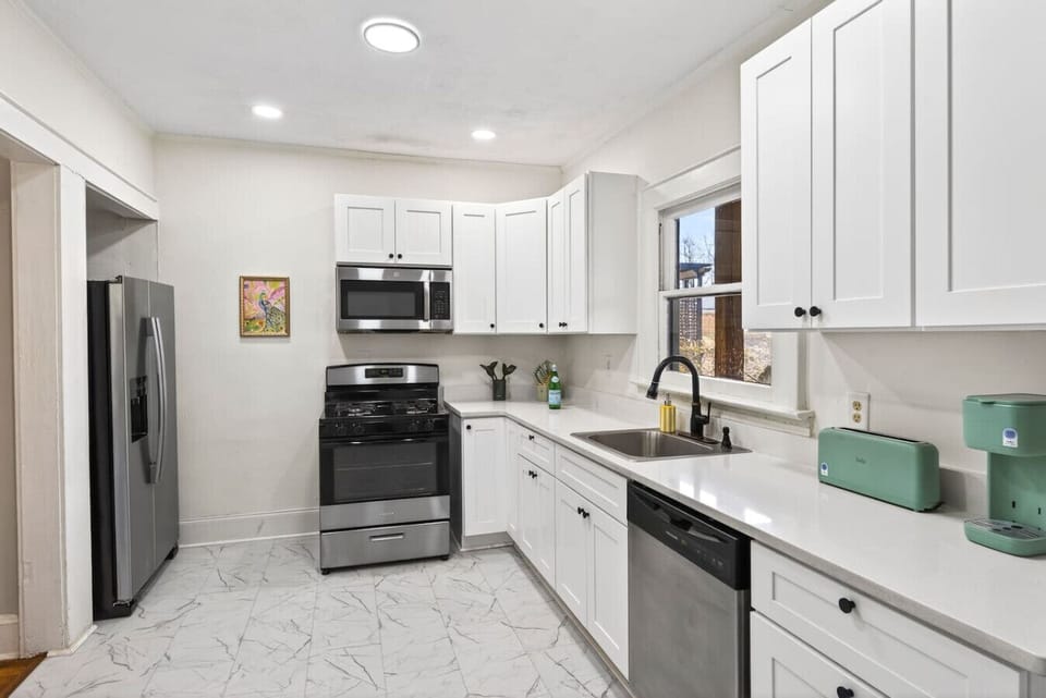 Fully stocked kitchen and coffee area to top off your date night, or just house your local take out