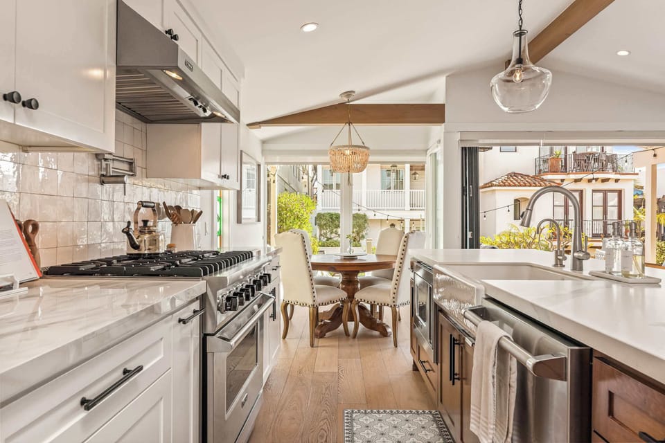 A bright, functional kitchen with generous counter space and a direct connection to the dining area.