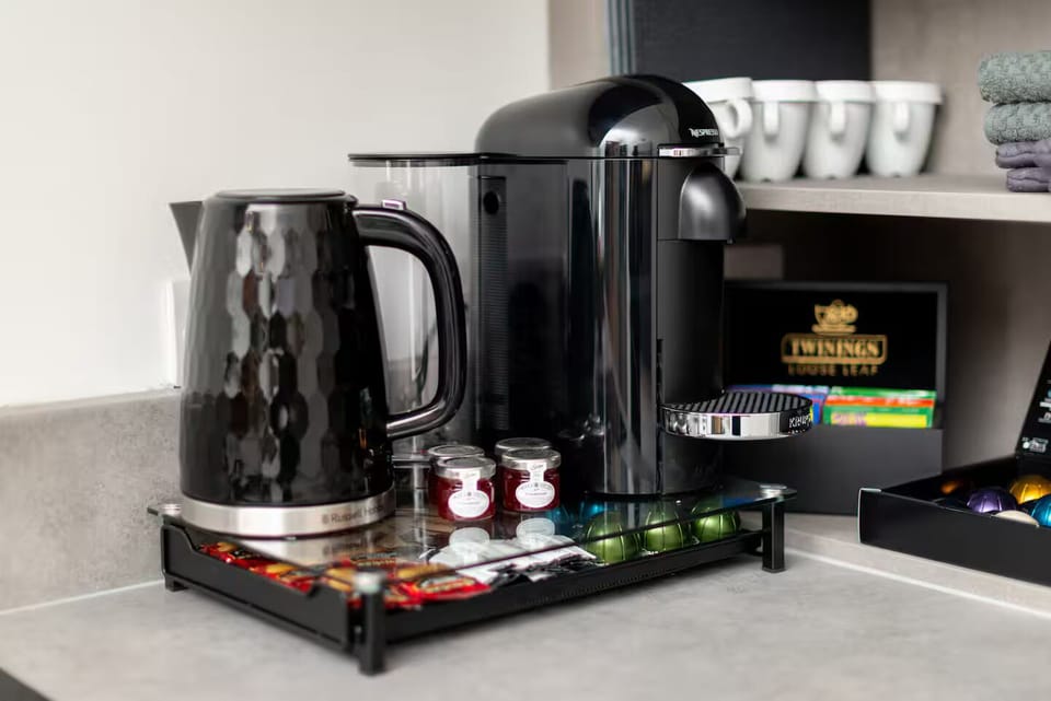 Presidential Apartment, 3 Bedrooms | Private kitchen | Coffee/tea maker, electric kettle, highchair