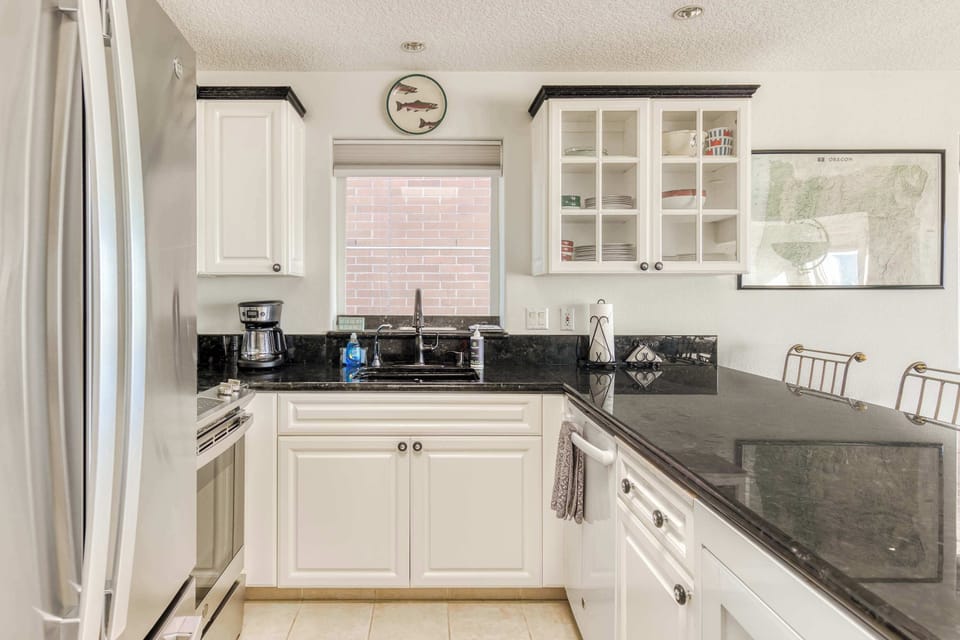 Enjoy prepping meals with plenty of counter space and natural light pouring in from the window.