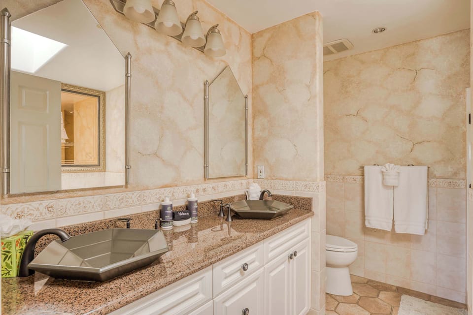 Comfortable and functional bathroom with double vanity for easy mornings.