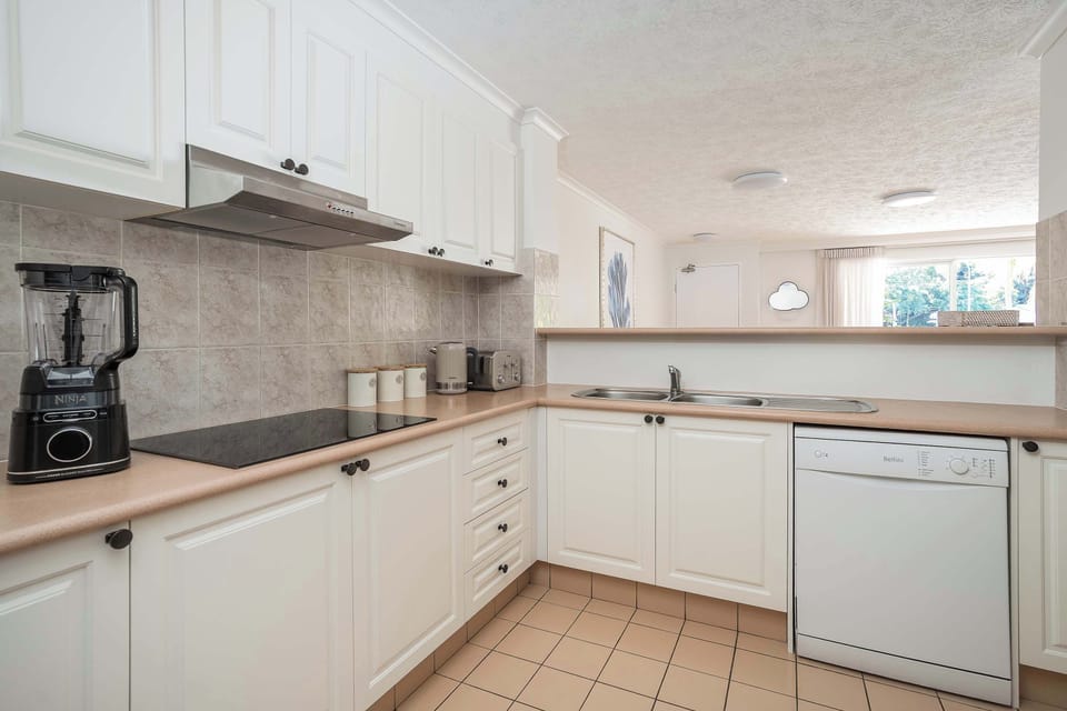 Kitchen is equipped with amenities and a powerful NINJA blender for breakfast smoothies and sunset cocktails