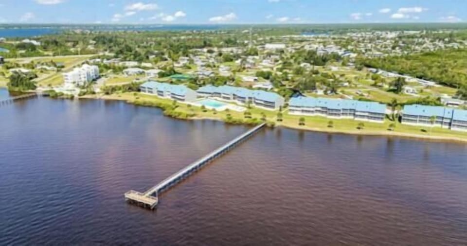 Waterfront 2BR – Pool, Dock & River Views (7299)