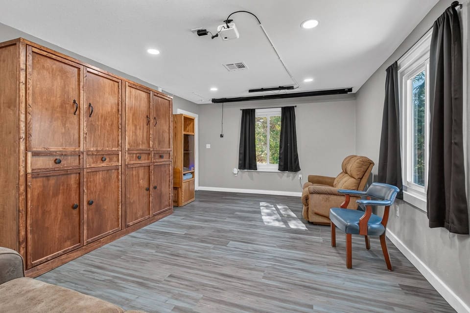 The Murphy beds fold up for extra space in the theater room