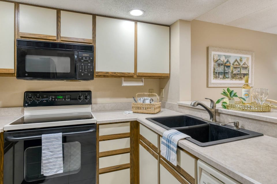 The fully stocked kitchen has everything you need to prepare your favorite foods and drinks.
