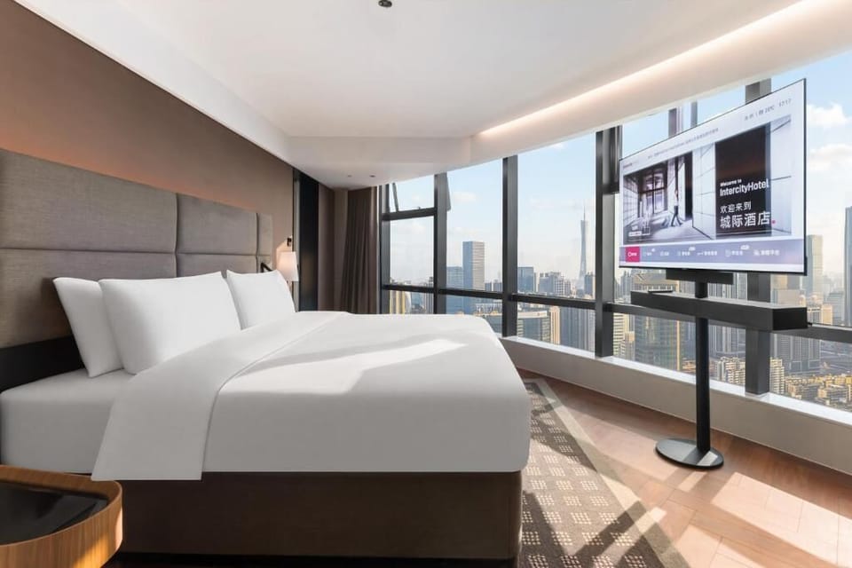 Luxury Suite, City View | Premium bedding, down comforters, Tempur-Pedic beds, free minibar