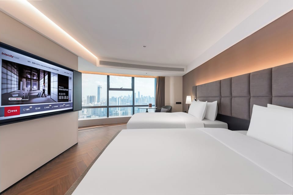 Premium bedding, down comforters, Tempur-Pedic beds, free minibar