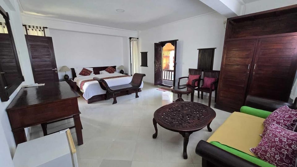 Deluxe Room, Garden View | Desk, laptop workspace, free WiFi
