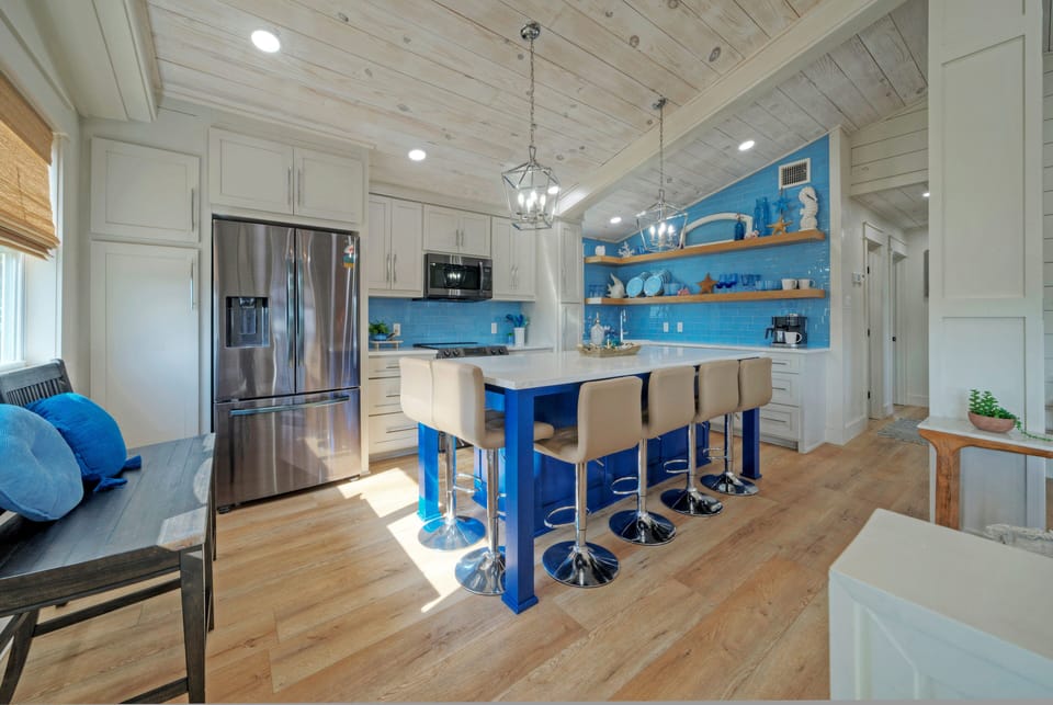 Additional barstool seating at the kitchen counter. (Seaglass Landing)