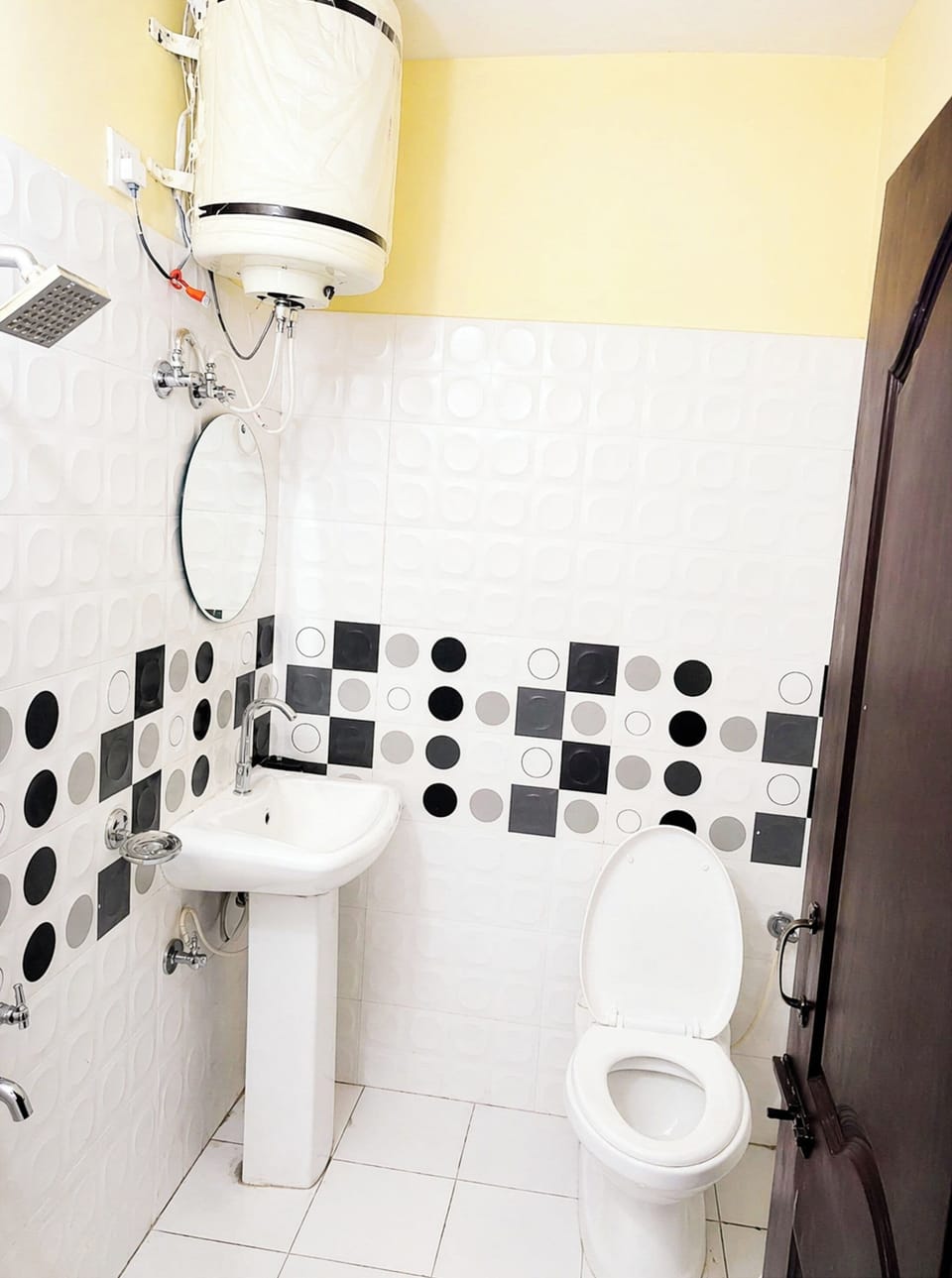 Shower, rainfall showerhead, slippers, towels