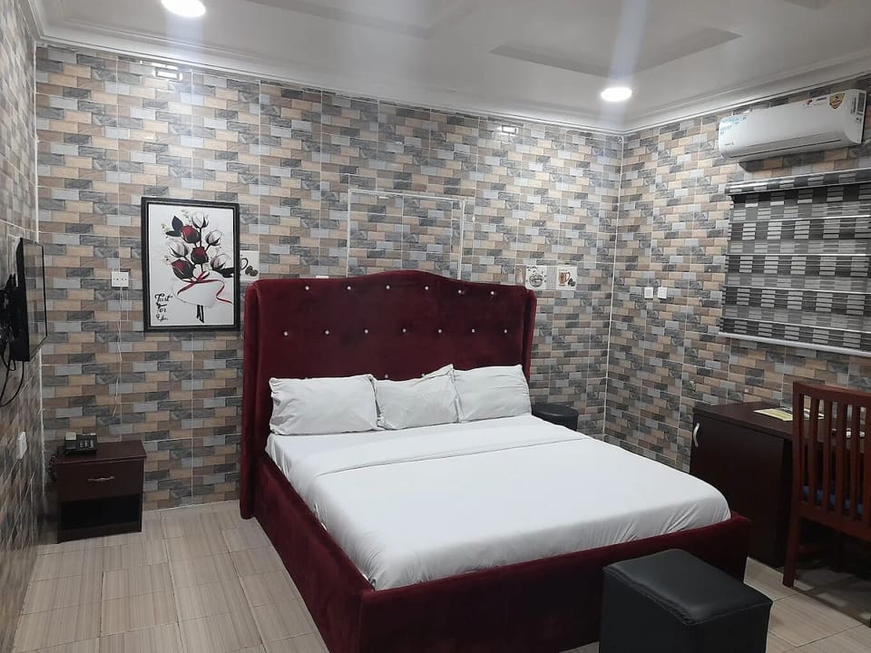 Economy Room, Balcony, City View | Desk, laptop workspace, blackout drapes, soundproofing