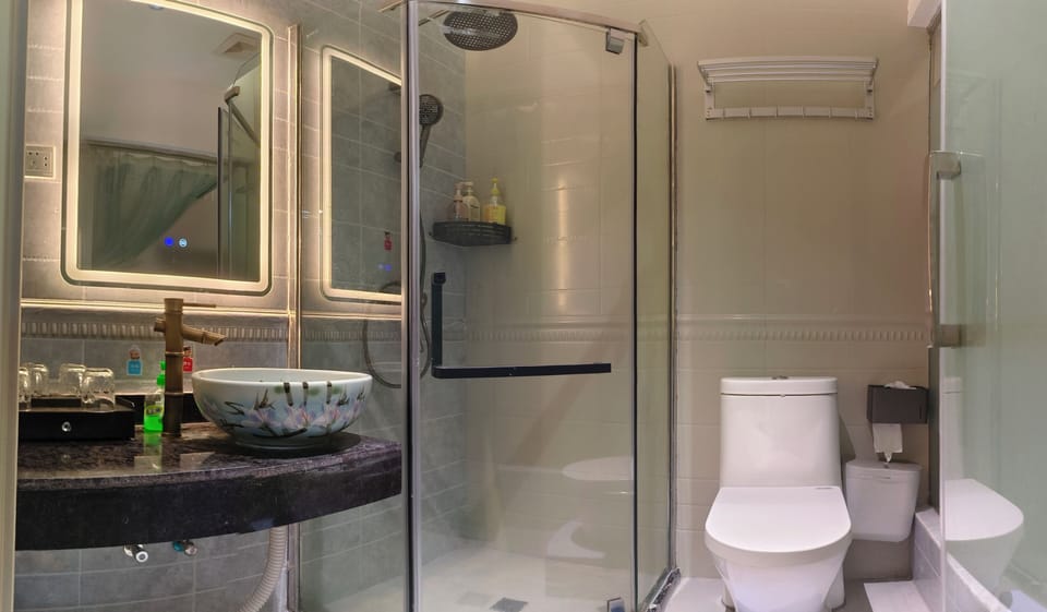 Family Suite, Hill View | Bathroom | Hair dryer, slippers, bidet, towels