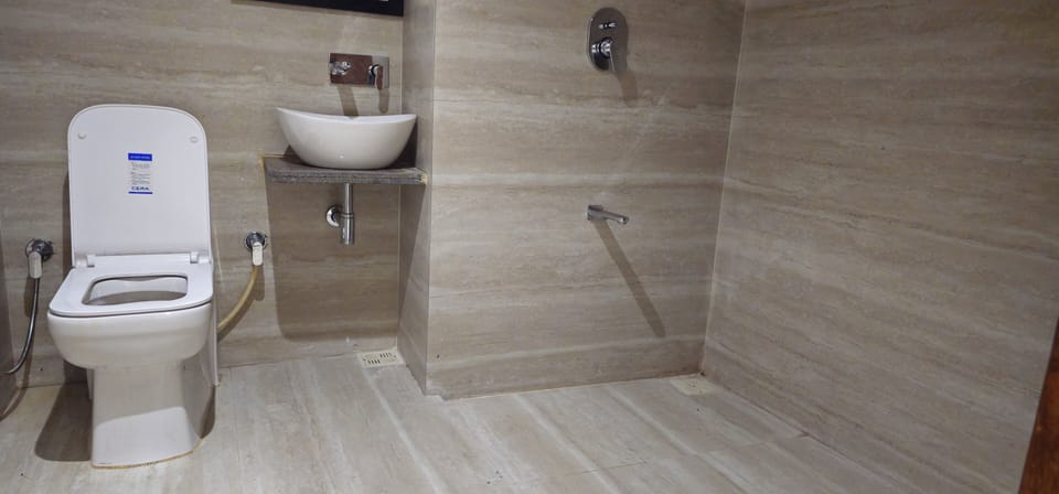 Deluxe Double Room, City View | Bathroom | Free toiletries, slippers, towels, soap