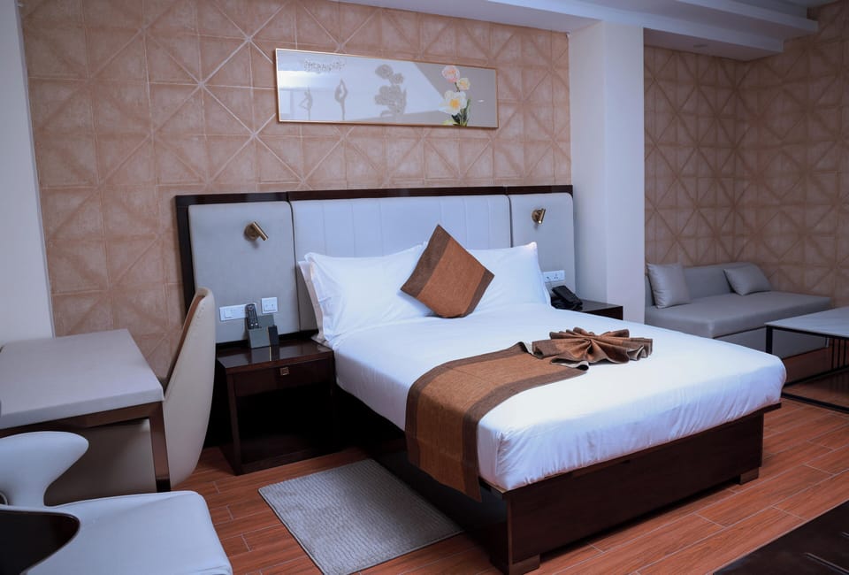 Deluxe Single Room, Balcony, City View | Desk, laptop workspace, blackout drapes, iron/ironing board