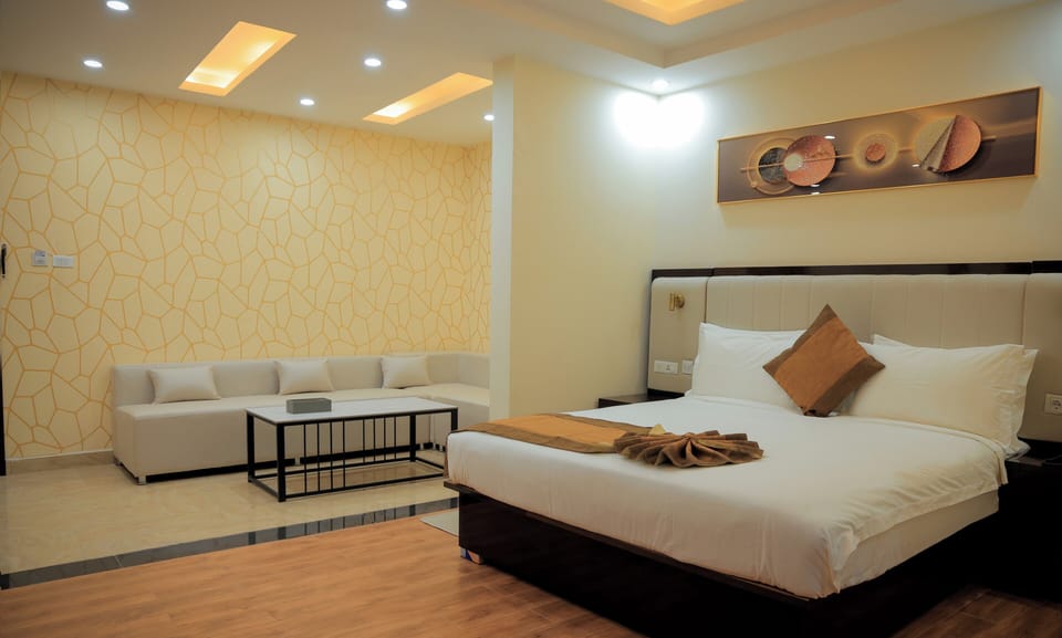 Suite, Balcony, City View | Desk, laptop workspace, blackout drapes, iron/ironing board