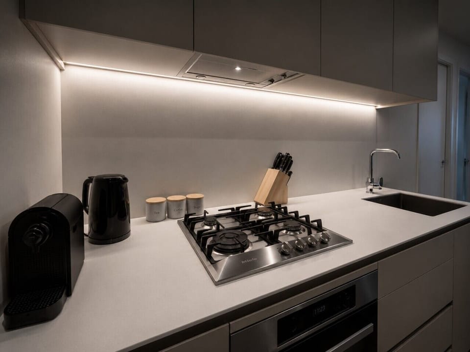 The kitchenette is fully equipped for a convenient stay.