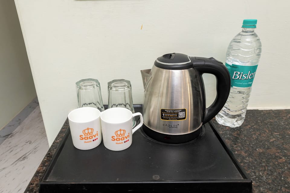 Deluxe Double Room, City View | Coffee and/or coffee maker