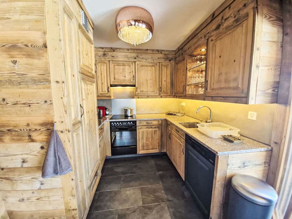 Wood, Furniture, Flooring, Cabinetry, Interior Design, Countertop, Floor, Kitchen, Ceiling, Wood Stain