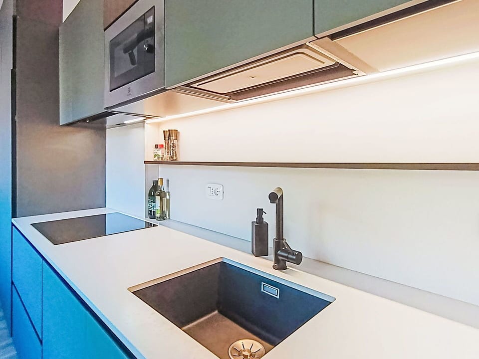 Kitchen, Countertop, Interior Design, Wood, Cabinetry, Kitchen Sink, Flooring, Plumbing Fixture, Kitchen Appliance, Sink