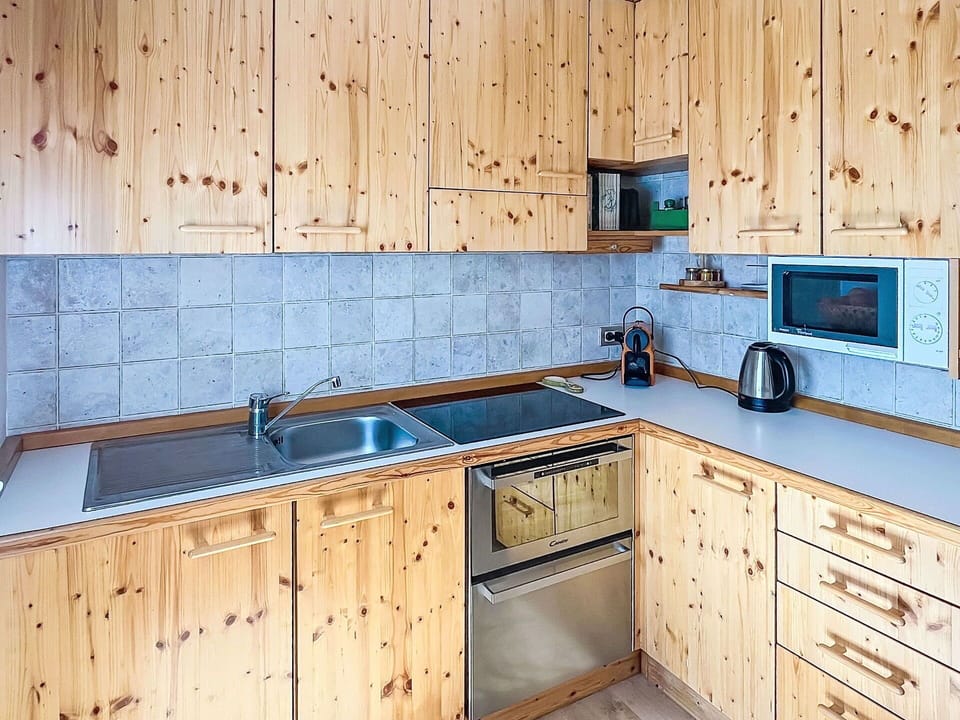Wood, Kitchen, Cabinetry, Countertop, Home, Sink, Ceiling, Major Appliance, Drawer, Kitchen Appliance