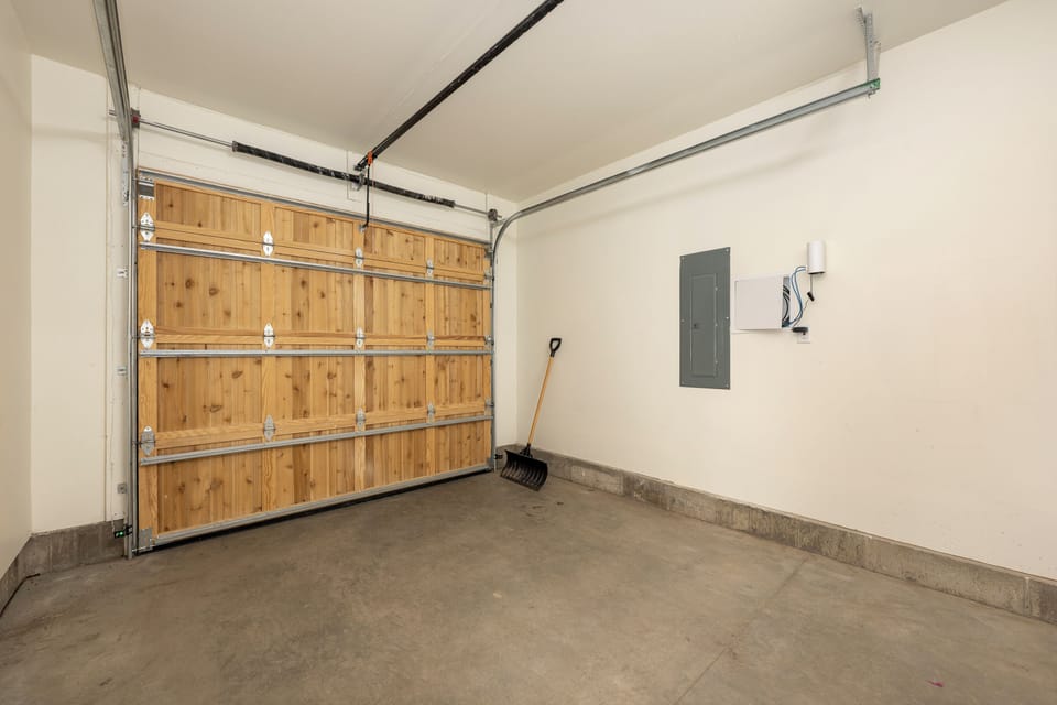Base Camp Townhome 106 offers secure garage with ample space for your vehicle and storage needs during your stay.