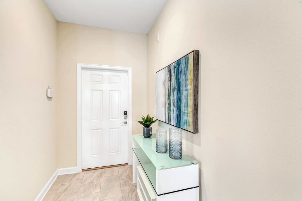 Your vacation starts here. This chic foyer features designer touches and elegant decor to greet you the moment you walk through the door.