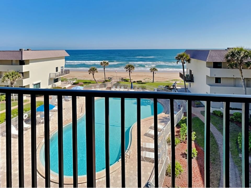 Balcony w/Ocean + Resort Community Pool View