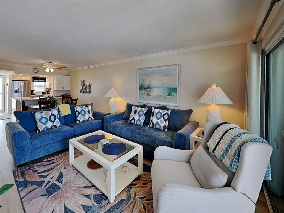 Living Room - Entertainment Area, TV, Lanai Access + Sofa Sleeper