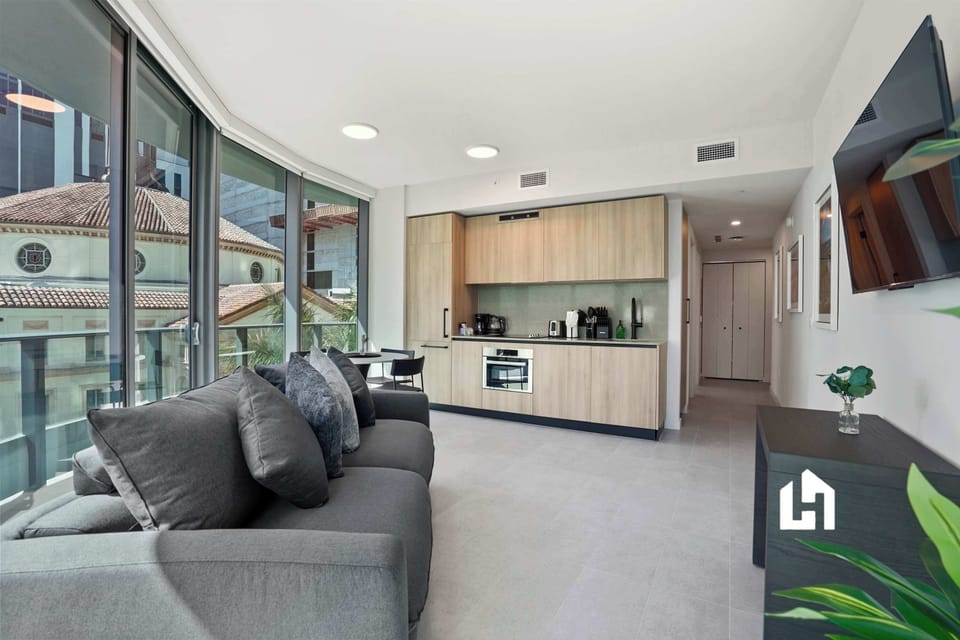 Modern open kitchen and lounge space designed for comfort.